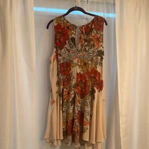 Beautiful sleeveless floral dress. Multi color. Size Large.